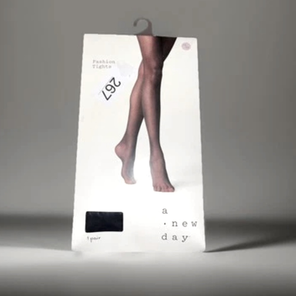 A New Day brand fashion tights in size 1x/2xl. Black W/Z Pattern 5ft-6ft 180-270
